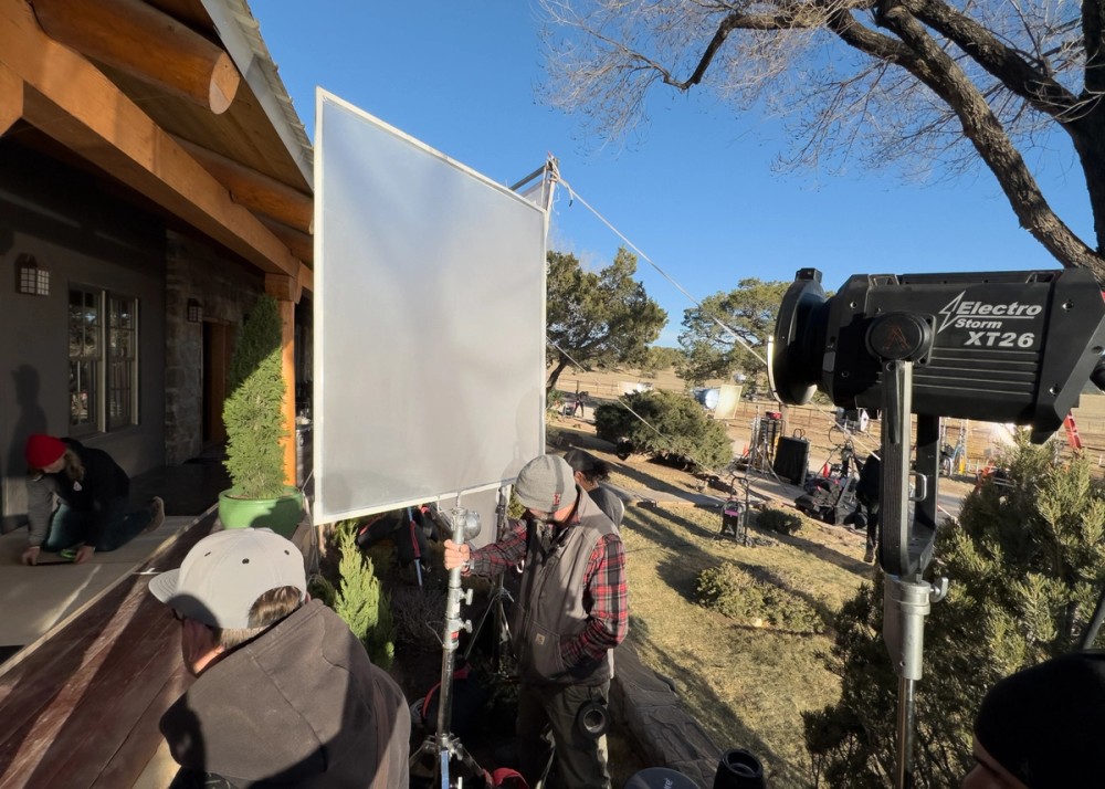 Crew place diffusion in front of an Electro Storm XT26 on location