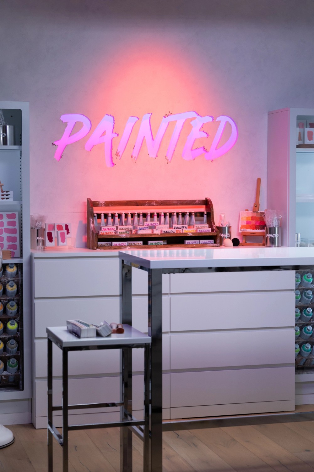 The “Painted” set, now lit with a Nova P600c and STORM 80cs, with the logo backlit by INFINIBAR PB12s